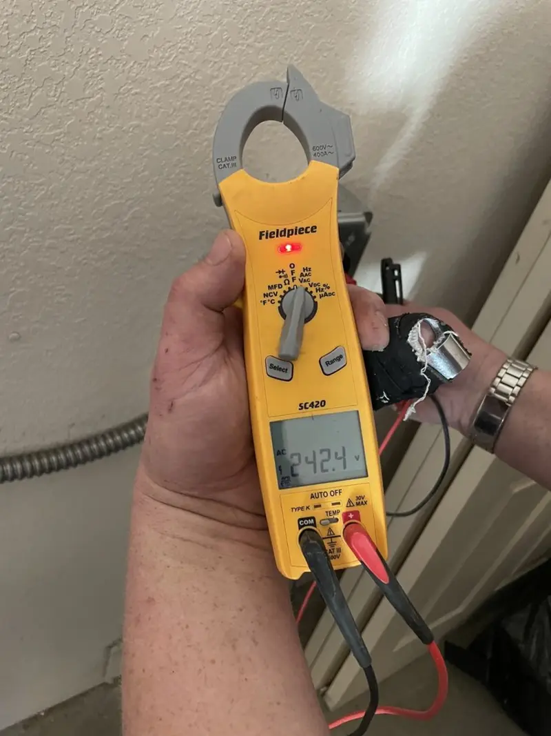 Voltage testing with clamp meter during Circuit Breaker Repair in Ligonier